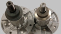 As seen on the right, the affected SureFit products have an indent on the top of the pulley mounting end of the blade spindle shaft.  As seen on the left, other products are fully open at the end.