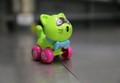 Wind-up Racoon toy (green)