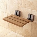 Shower seat with oil-rubbed bronze finish on support rods and bracket covers